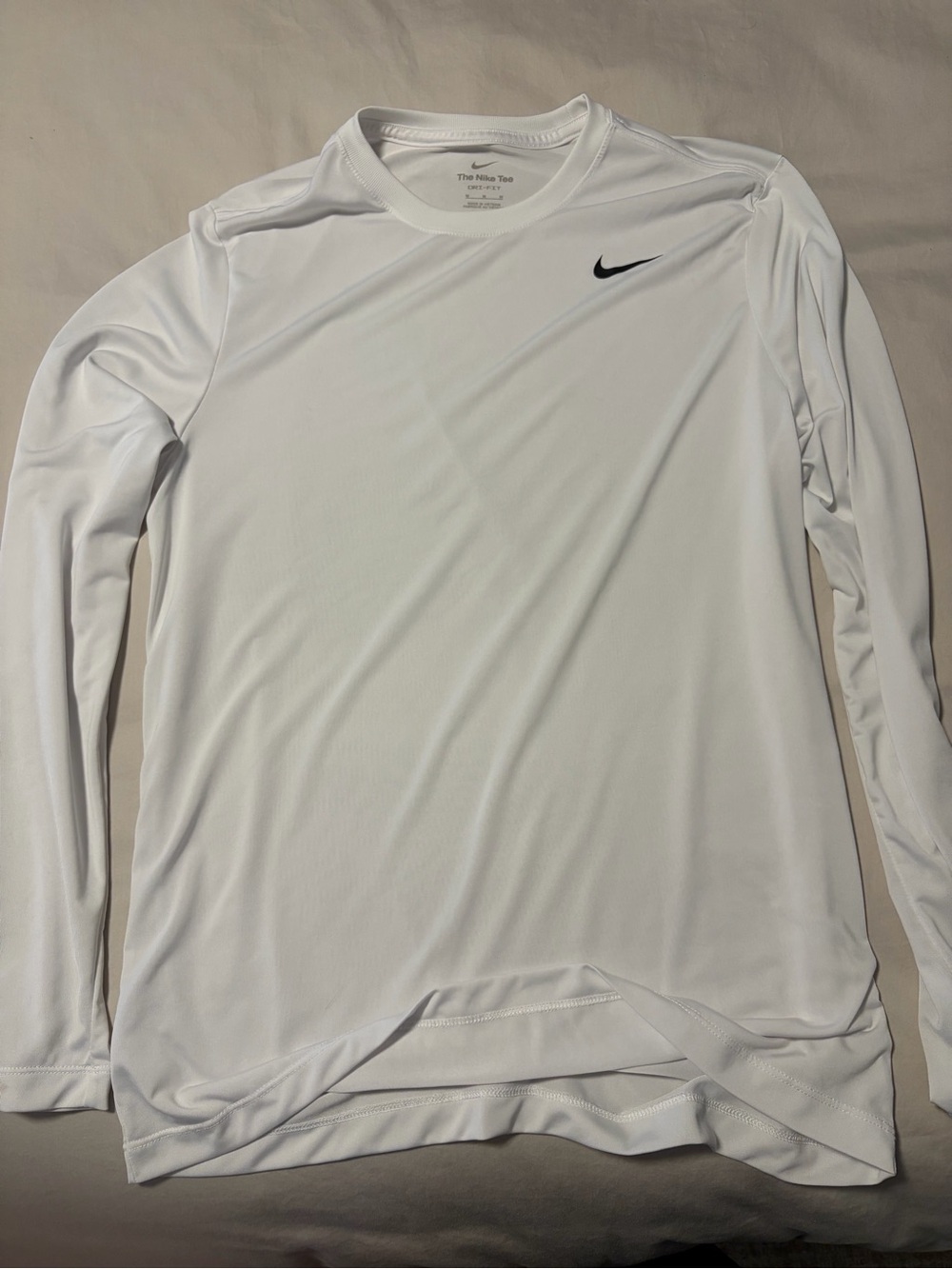 Nike White Long-Sleeve Dri-FIT Performance Top with Black Swoosh